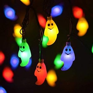 Image of green, yellow, blue, and red smiley string ghost lights. 